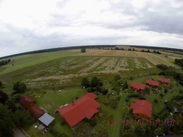 Feriendomizil mit 5 Holzblockbohlenhäuser auf 6.000 m² Anwesen